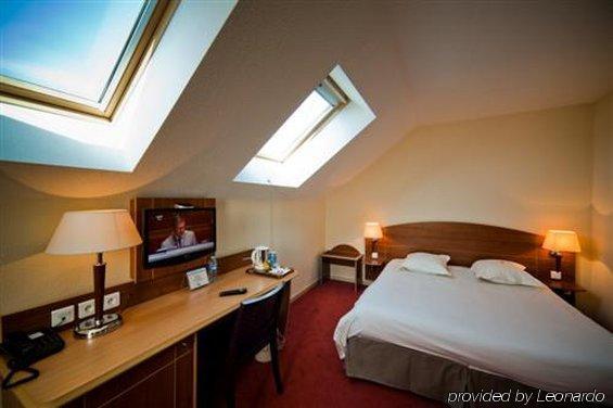 Hotel Ibis Styles Clermont-Ferrand Aeroport Pokoj fotografie